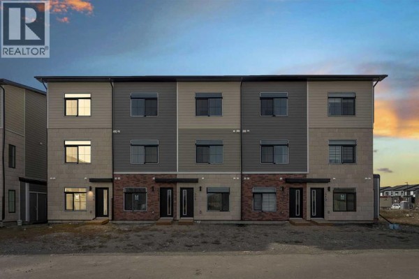 Living room - 406, 156 Park Street, Cochrane, AB T4C3H3 Photo 2