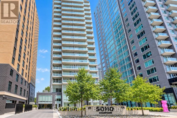 Exterior of a modern high-rise condominium building with glass balconies and trees in front. - 406 - 111 Champagne Avenue, Ottawa