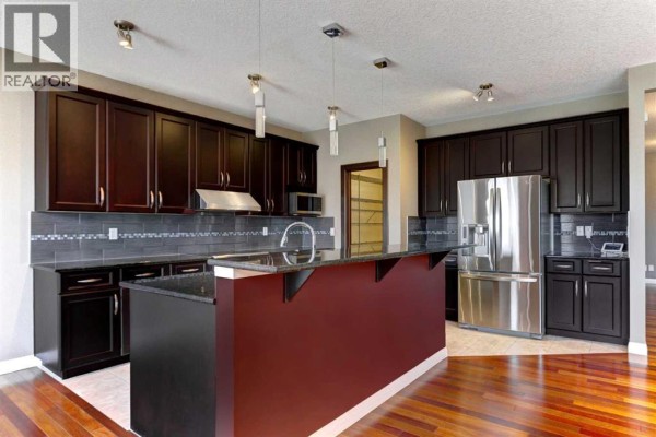 Living room - 406 Silverado Boulevard Sw, Calgary, AB T2X0N9 Photo 3