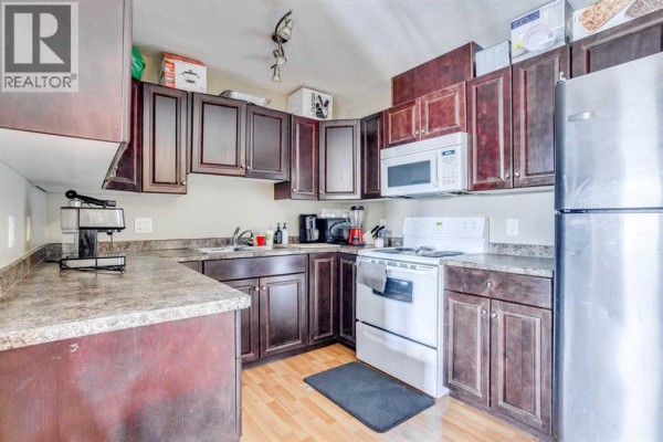 Kitchen - 407, 10217 Queen Street, Fort Mcmurray, AB T9H5S5 Photo 5