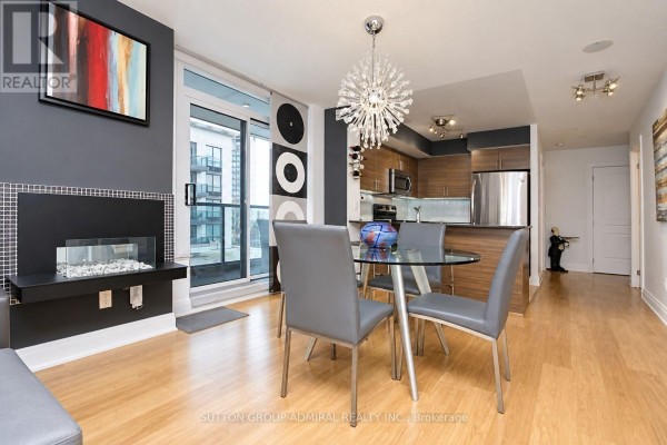 Indoor swimming pool with bright lighting, large windows, and a shallow area marker. - 407 - 30 North Park Road, Vaughan