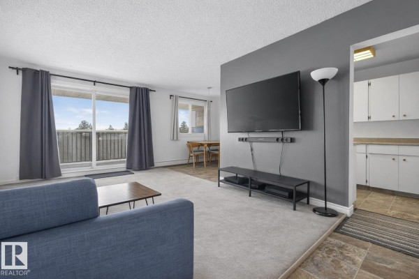 Primary Bedroom - #407 5125 Riverbend Rd Nw, Edmonton, AB T6H5K5 Photo 4