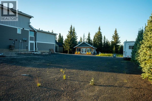 407 Cottageclub Grove, Rural Rocky View County, AB T4C1B1 Photo 4