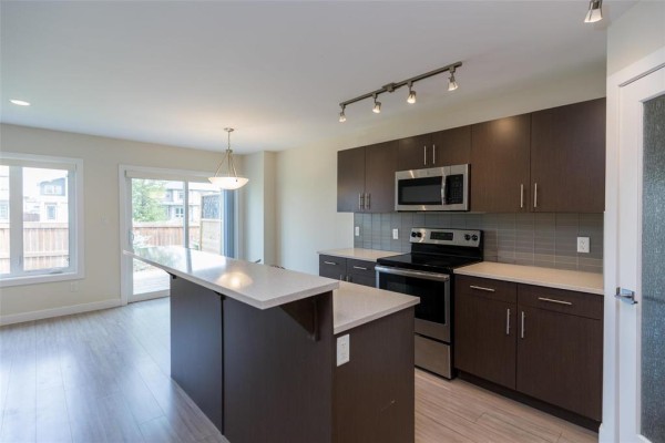 Eat in kitchen - 408 255 Peguis Street, Winnipeg, MB R3W0H4 Photo 3