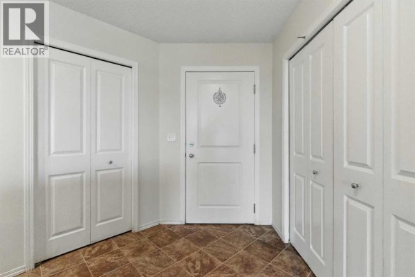 Living room - 409, 15 Saddlestone Way Ne, Calgary, AB T3J0S3 Photo 3