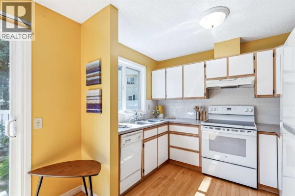 Kitchen - 41, 999 Canyon Meadows Drive Sw, Calgary, AB T2W2S6 Photo 5