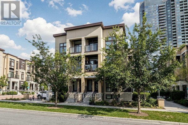 Wide shot of townhouse complex showing three stories and balconies. - 41 - 19 Eldora Avenue, Toronto