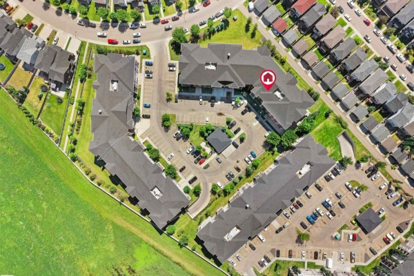 Overhead aerial view of apartment buildings and parking lots. - #410 18122 77 St Nw, Edmonton