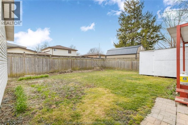 Aerial view of house with detached garage and shed - 410 Mcnaughton Avenue East Chatham