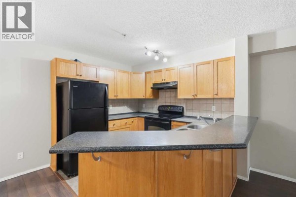 Dining room - 4103, 60 Panatella Street Nw, Calgary, AB T3K0M4 Photo 5