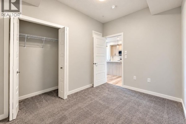 Living room - 411, 40 Carrington Plaza Nw, Calgary, AB T3P1X7 Photo 5