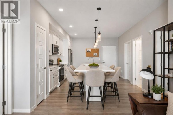 Bedroom - 411, 4350 Seton Drive Se, Calgary, AB T3M3B1 Photo 3
