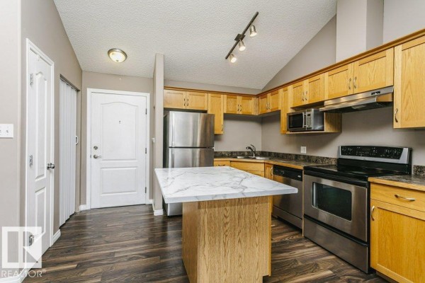 Dining room - #411 3425 19 St Nw, Edmonton, AB T6T2B5 Photo 2
