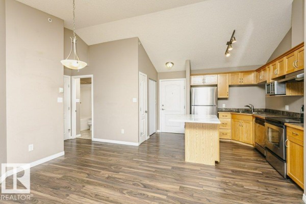 Kitchen - #411 3425 19 St Nw, Edmonton, AB T6T2B5 Photo 3