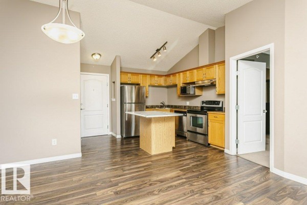 Primary Bedroom - #411 3425 19 St Nw, Edmonton, AB T6T2B5 Photo 4
