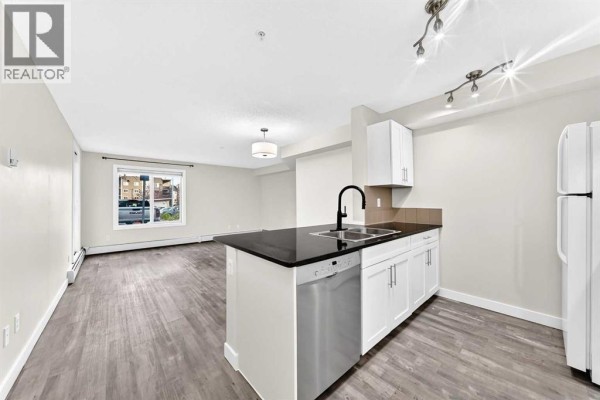 Dining room - 4118, 403 Mackenzie Way Sw, Airdrie, AB T4B3V7 Photo 3