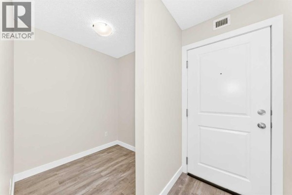 Living room - 4118, 403 Mackenzie Way Sw, Airdrie, AB T4B3V7 Photo 4