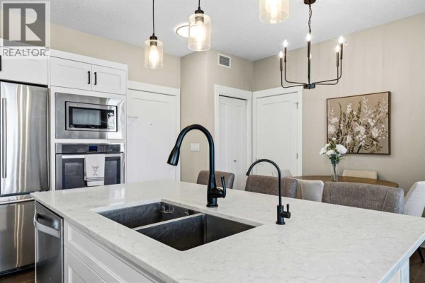 Kitchen - 412, 10 Walgrove Walk Se, Calgary, AB T2X4E3 Photo 2