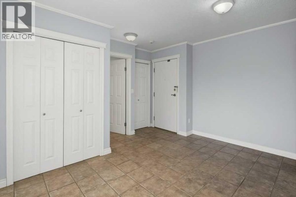 Primary Bedroom - 414, 333 Garry Crescent Ne, Calgary, AB T2K5W9 Photo 4