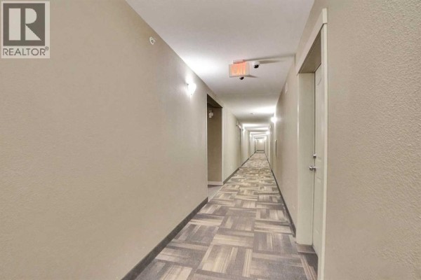 Living room - 414, 7210 80 Avenue Ne, Calgary, AB T3J0N7 Photo 4