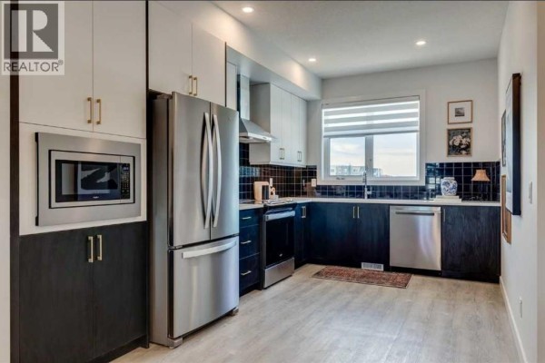 Primary Bedroom - 414, 8235 8 Avenue Sw, Calgary, AB T3H6H2 Photo 4