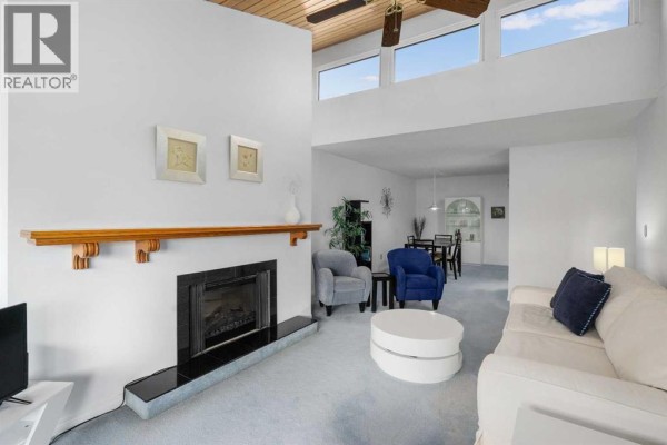 Living room - 416, 3730 50 Street Nw, Calgary, AB T3A2V9 Photo 3