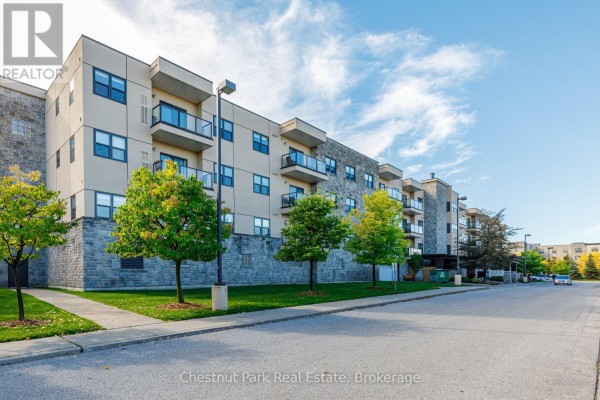 Exterior of a modern apartment building with balconies and stone accents. - 416 - 91 Raglan Street, Collingwood