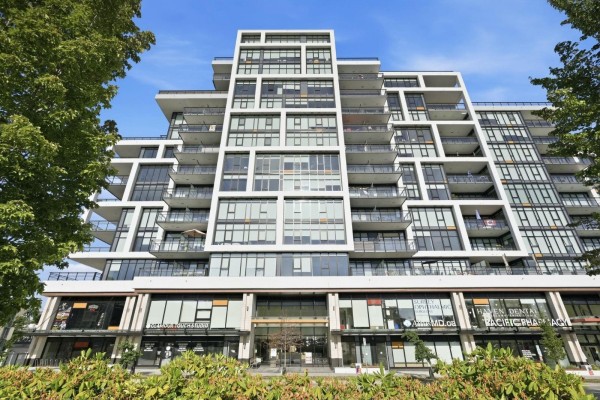 Bright lobby with marble flooring, wood accents, and contemporary seating area. - 416 1526 Finlay Street, White Rock