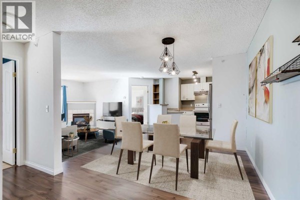 Kitchen - 418, 4000 Somervale Court Sw, Calgary, AB T2Y4J3 Photo 5