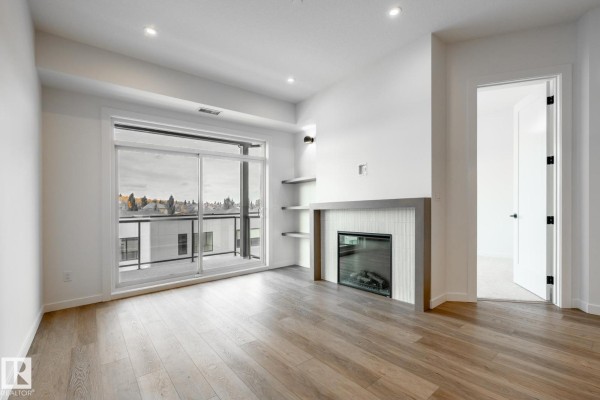 Kitchen - #418 7459 May Common Nw, Edmonton, AB T6R0X6 Photo 3
