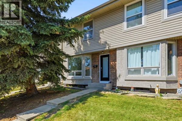 Bedroom - 42, 123 Queensland Drive Se, Calgary, AB T2J5J4 Photo 3