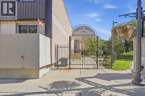 Exterior entrance gate to Village Square buildings at 40 & 42 Tannery Street East. - 42 Tannery Street E Unit# 246, Cambridge