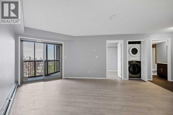 Primary Bedroom - 420, 7180 80 Avenue Ne, Calgary, AB T3J0N6 Photo 5