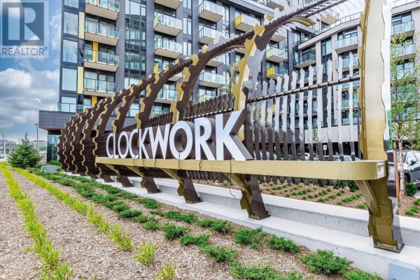 Sculptural metal sign with the name "Clockwork" in large letters. - 421 - 3008 William Cutmore Boulevard, Oakville