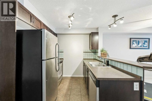 Living room - 4210, 60 Panatella Street Nw, Calgary, AB T3K0M1 Photo 5