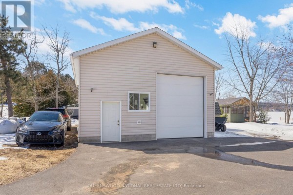 Detached garage with large overhead door & pedestrian door - 42125 Combermere Road Ne, Madawaska Valley