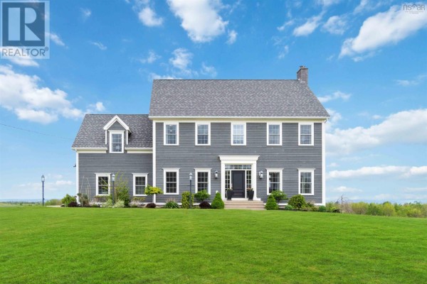 Front exterior of a grey two-story house with white trim and a black front door, on a grassy lawn. - 423 Canaan Road, Nicholsville