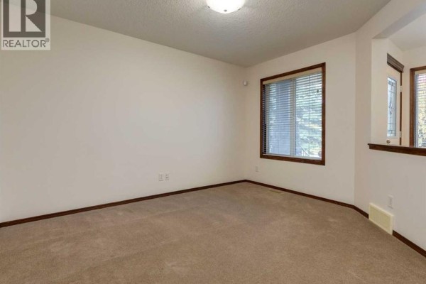 Den - 424 Hidden Creek Boulevard Nw, Calgary, AB T3K6J1 Photo 4