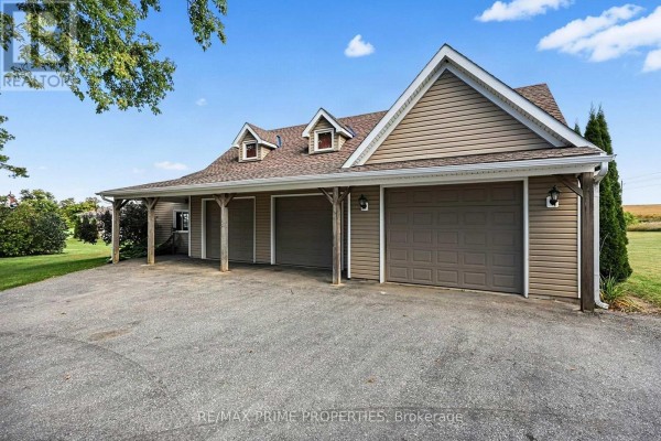 Finished basement with wood floors, orange accent wall, entertainment area, and office space. - 426 Zephyr Road, Uxbridge
