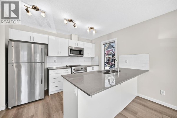 2pc Bathroom - 428 Cranbrook Square Se, Calgary, AB T3M3K9 Photo 4