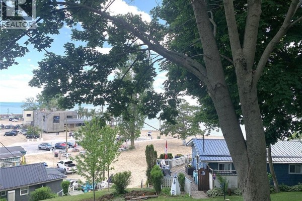 View of Lake Erie with boats and beach area from a distance. - 43 Bucks Park, Port Dover