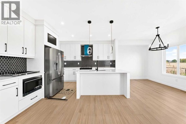 2pc Bathroom - 43 Sandpiper Bend, Chestermere, AB T1X2S6 Photo 5