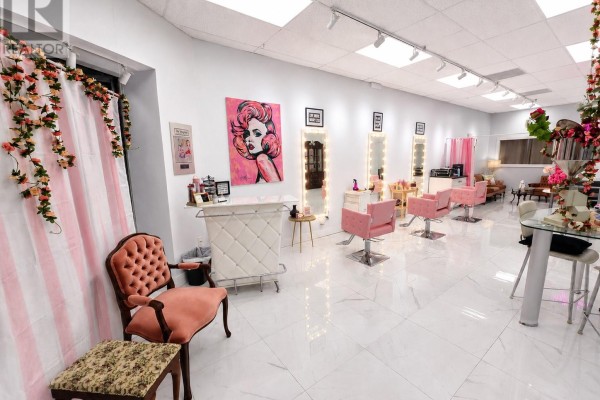 Salon chairs and vanity mirrors with bright pink upholstery and LED lighting. - 430 Topsail Road Unit#77, St  John S