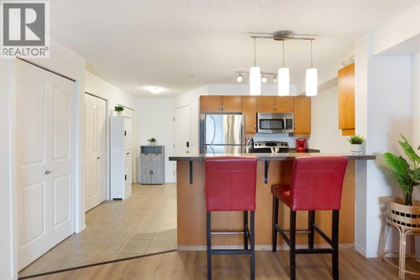Living room - 4310, 60 Panatella Street Nw, Calgary, AB T3K0M4 Photo 3