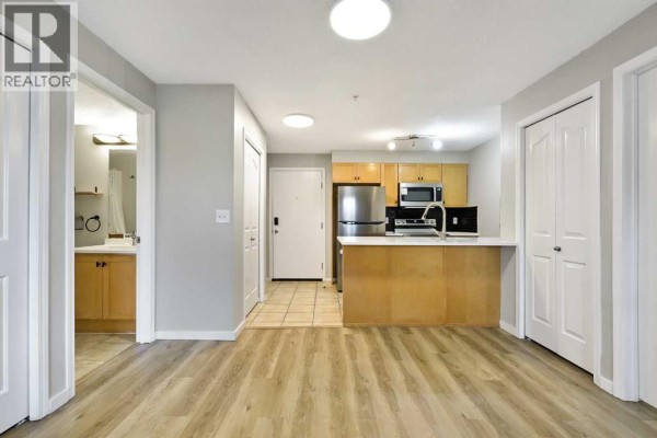 Living room - 4313, 60 Panatella Street Nw, Calgary, AB T3K0M2 Photo 5
