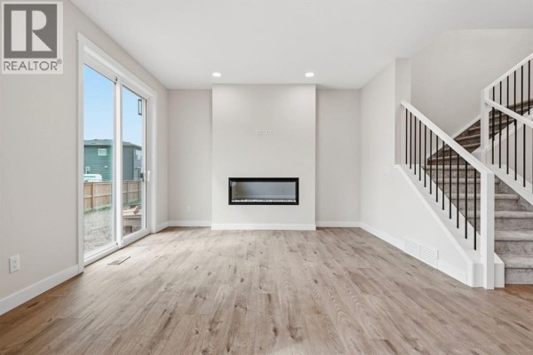 Living room - 435 Kinniburgh Loop, Chestermere, AB T1X3C4 Photo 4