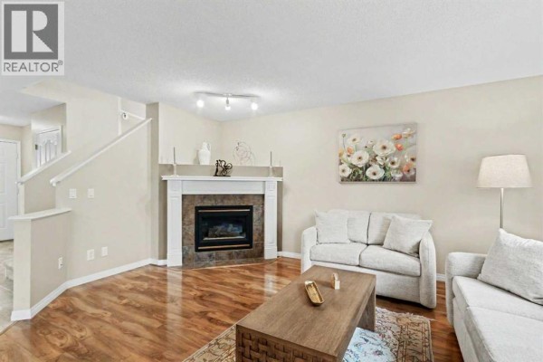 Living room - 436 Rocky Ridge Bay Nw, Calgary, AB T3G4H8 Photo 4