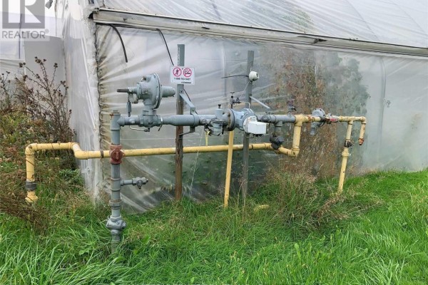 Gas pipeline and equipment near greenhouse - 43621 Highway 3, Wainfleet
