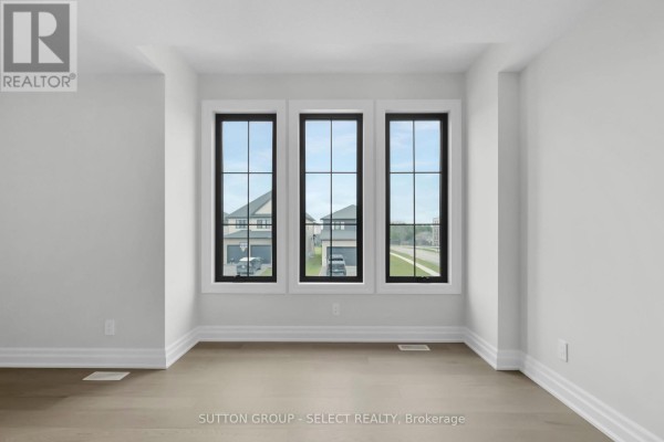 Three large windows overlooking street with houses - 4387 Green Bend Road London South
