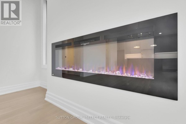 Linear electric fireplace with colorful flames - 4387 Green Bend Road London South